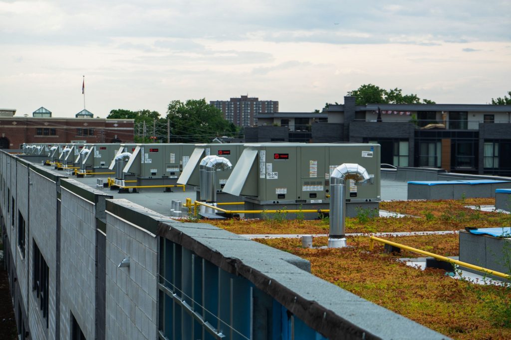 A view of the roof of a building with mechanical equipment on top