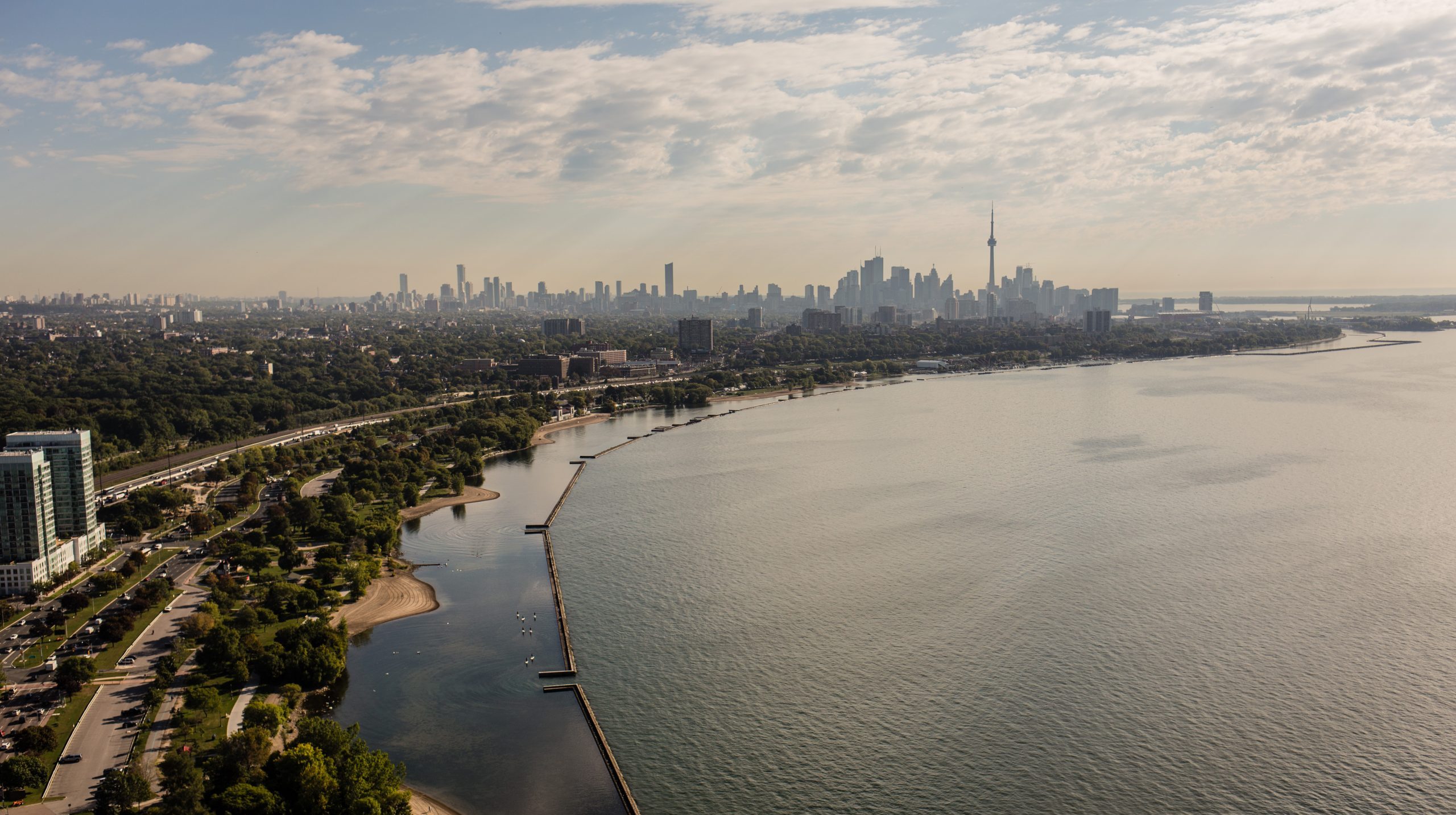 A view of Toronto's skyline from the west, looking over the coast of Lake Ontario