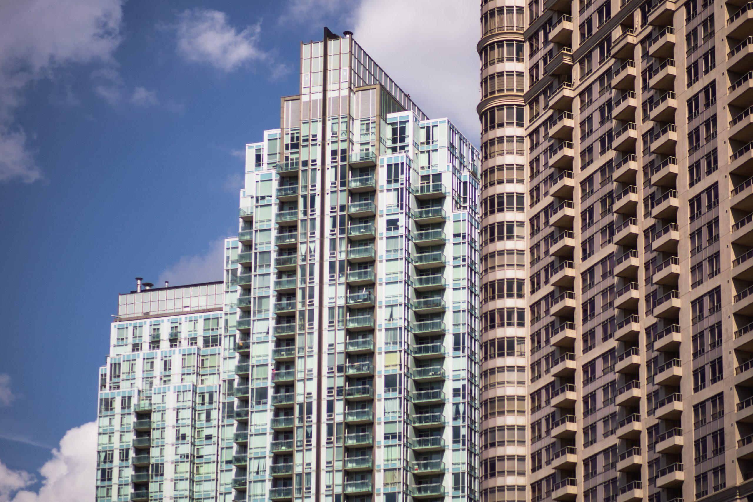 A skyline view of three tall condo buildings in Mississauga