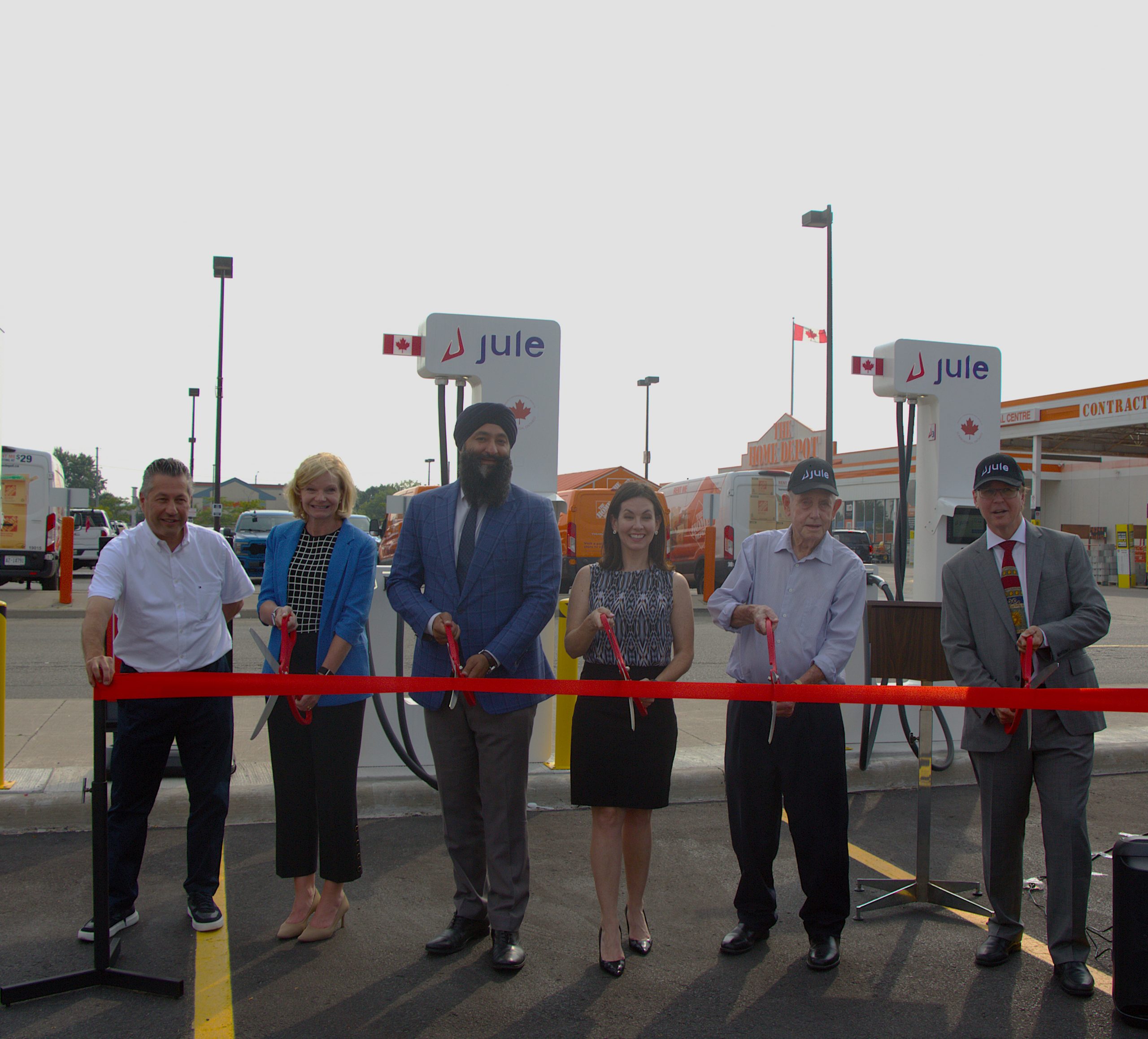 Project partners join a ribbon-cutting ceremony at Longo's, Milton.